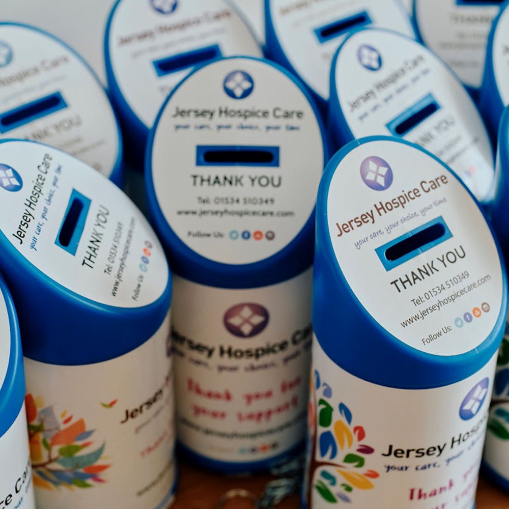 Image of blue Jersey Hospice Care collection tins