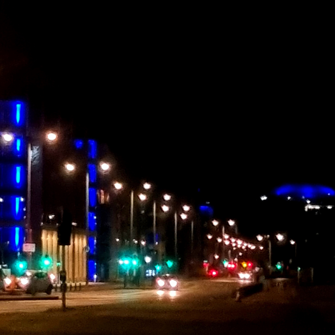 Image of buildings lit up blue to celebrate Hospice 