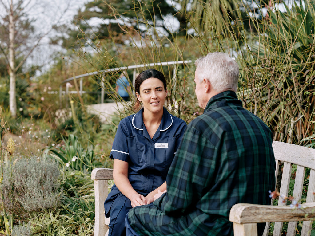 Nurse and patient in garden