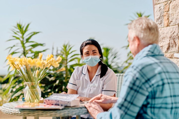 Image of Hospice nurse and patient in gardens