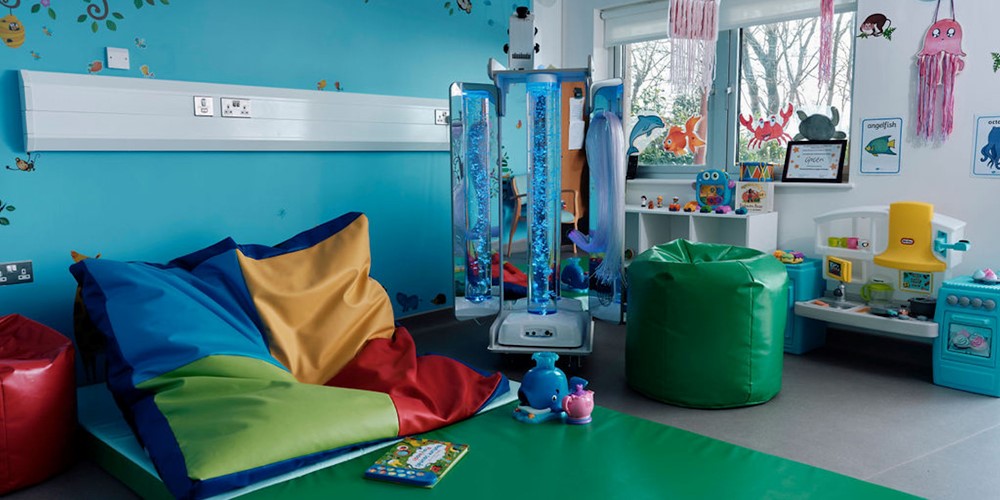 Image of sensory room at Jersey Hospice, mats on floor, toys around the room