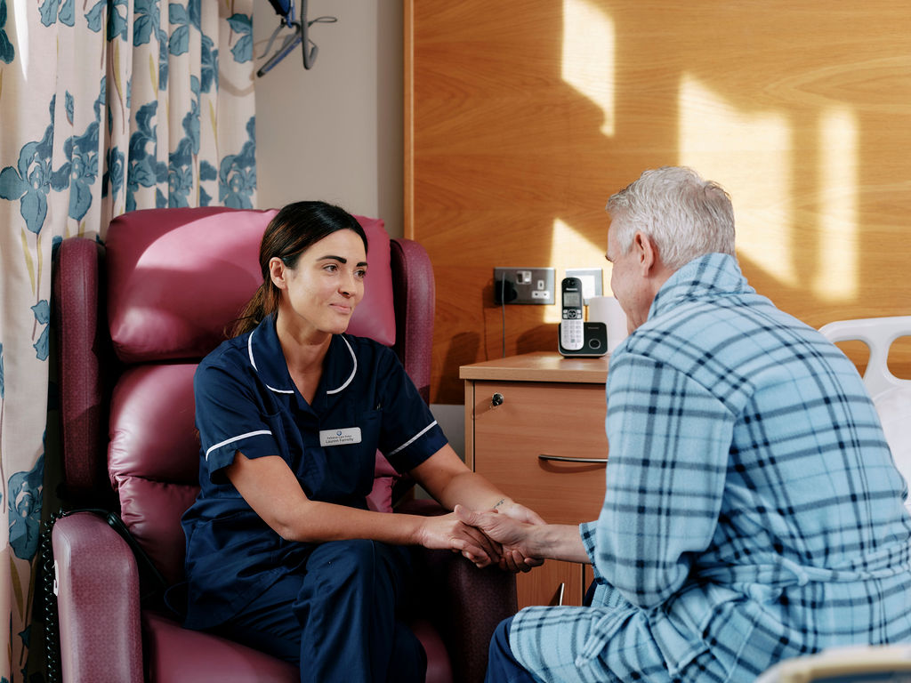 Nurse and patient talking