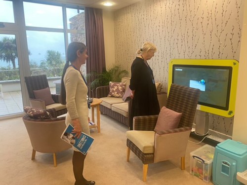 Trustees Kathy and Tarina in the family room on the In Patient Unit carrying out the 15 Steps Challenge